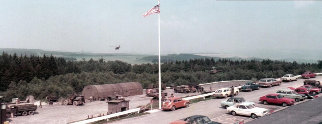 The mess hole was moved to the motor pool area while the mass hall was under construction. That's why there is a tent in this picture.