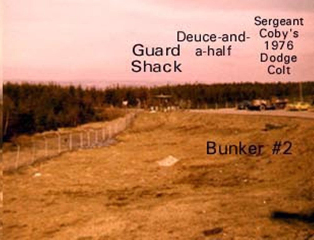 Looking at the guard gate and Colby's car