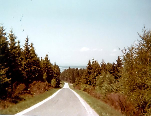 The road downhill from the barracks to town